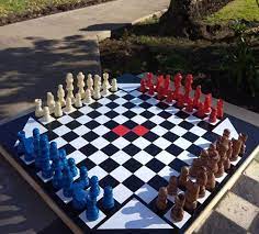 Tablero de ajedrez con jugadores